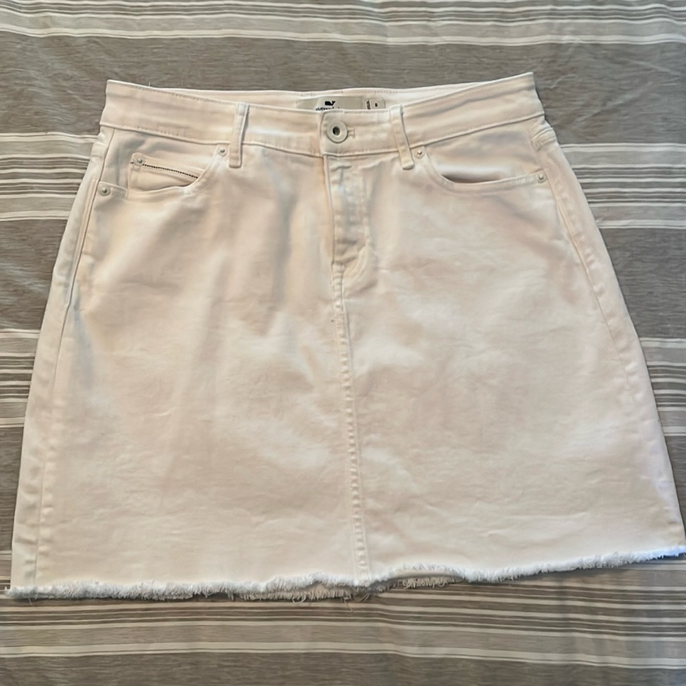 Vineyard vines, raw ham, white denim skirt.